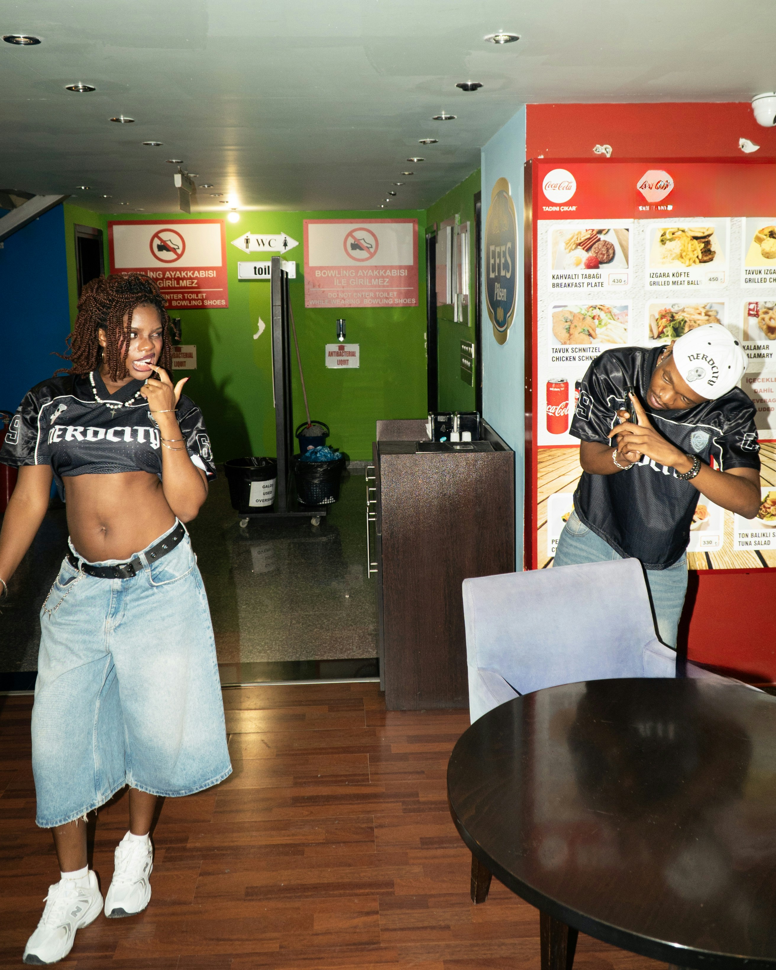 Person in stylish streetwear outfit, embodying urban fashion and self-expression