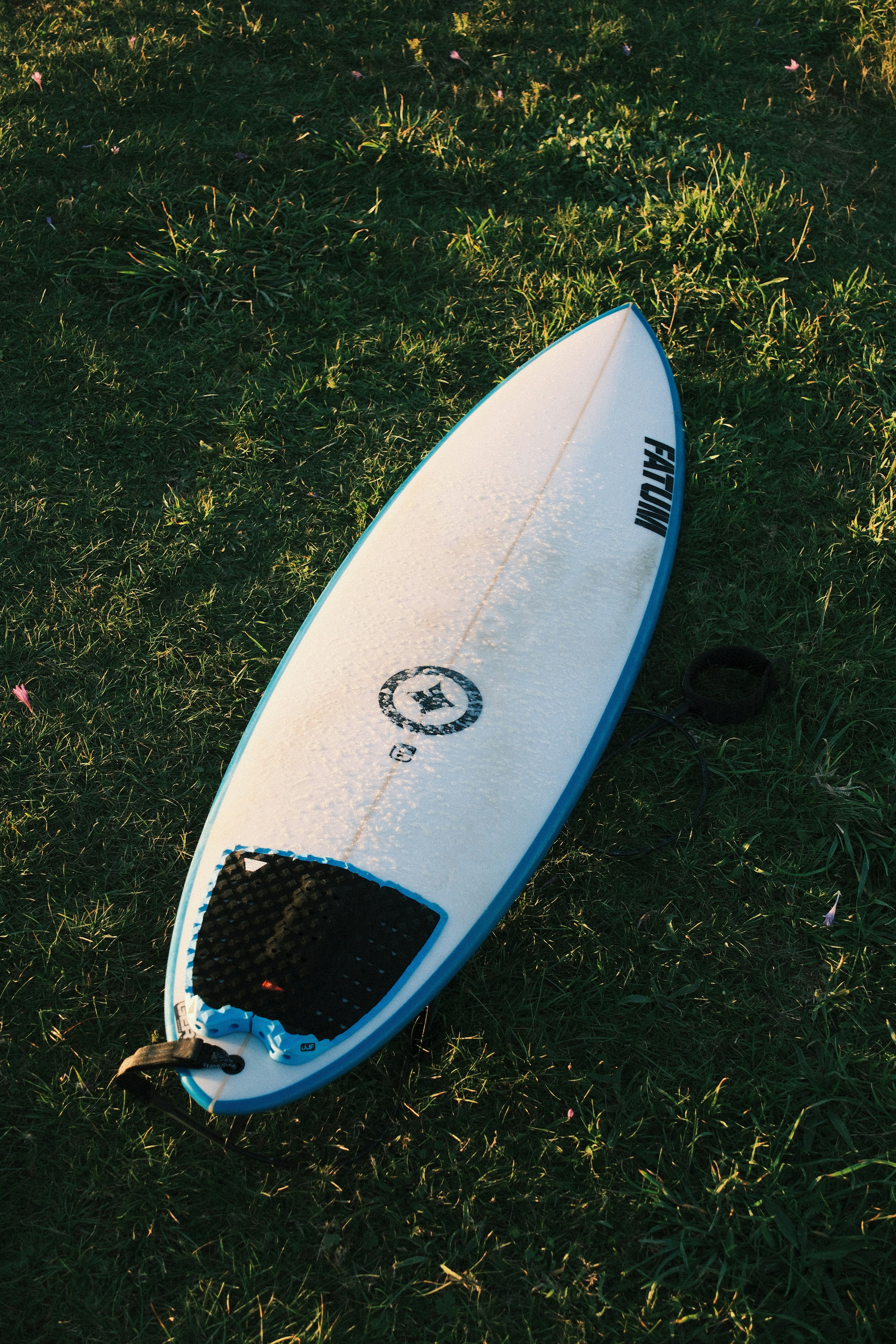 A close-up of a surfboard with wax.
