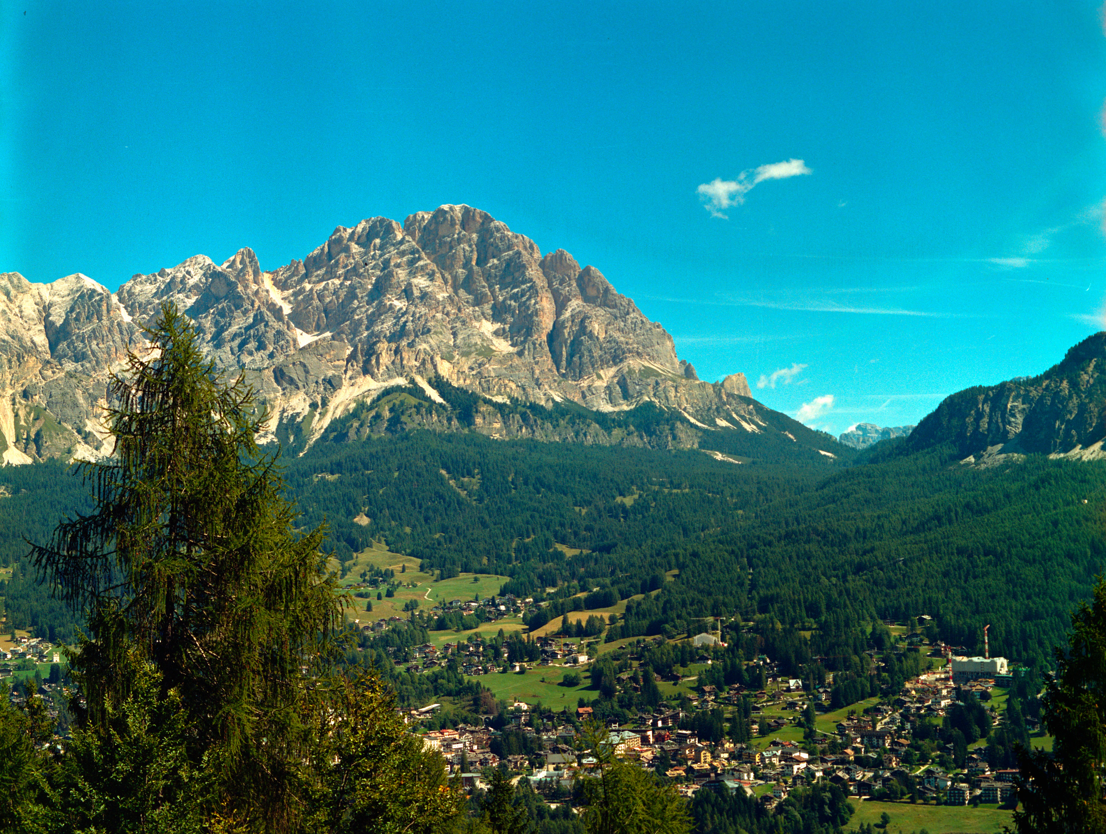 Dolomite peaks rising above Cortina d’Ampezzo and its green valley