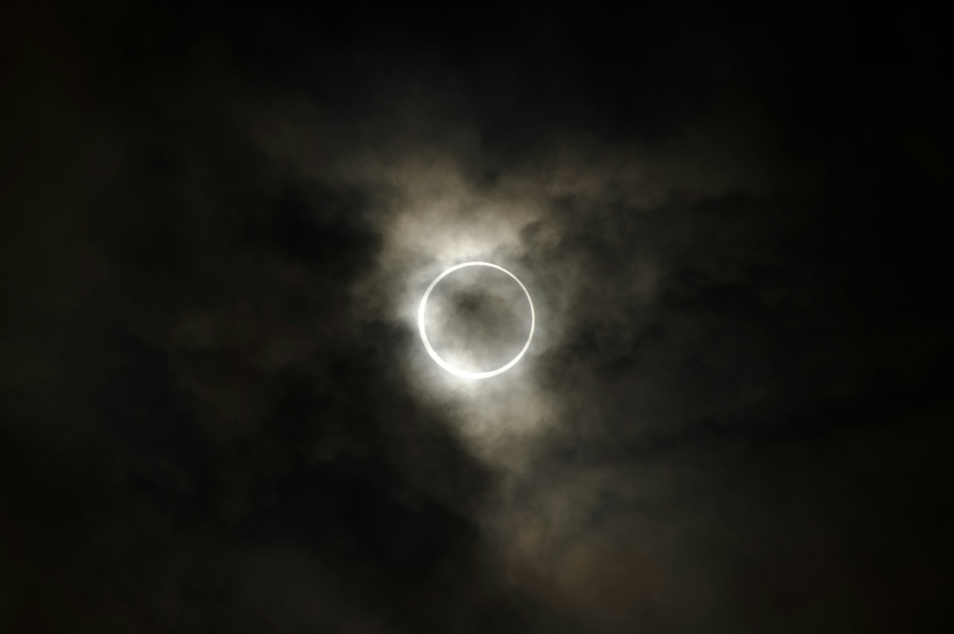 A ring of fire solar eclipse through clouds