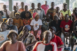 A diverse group of people sitting together