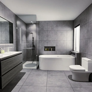Modern bathroom with bathtub, shower, and vanity.