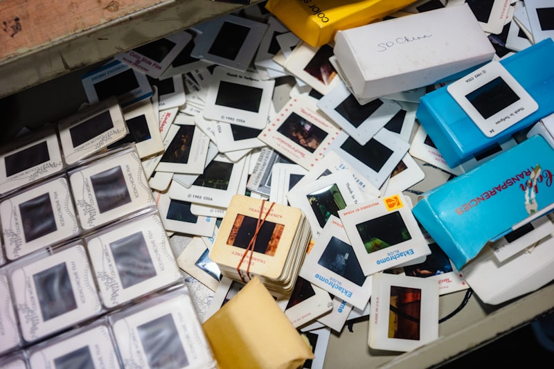 Stacks of vintage slides and archive storage boxes