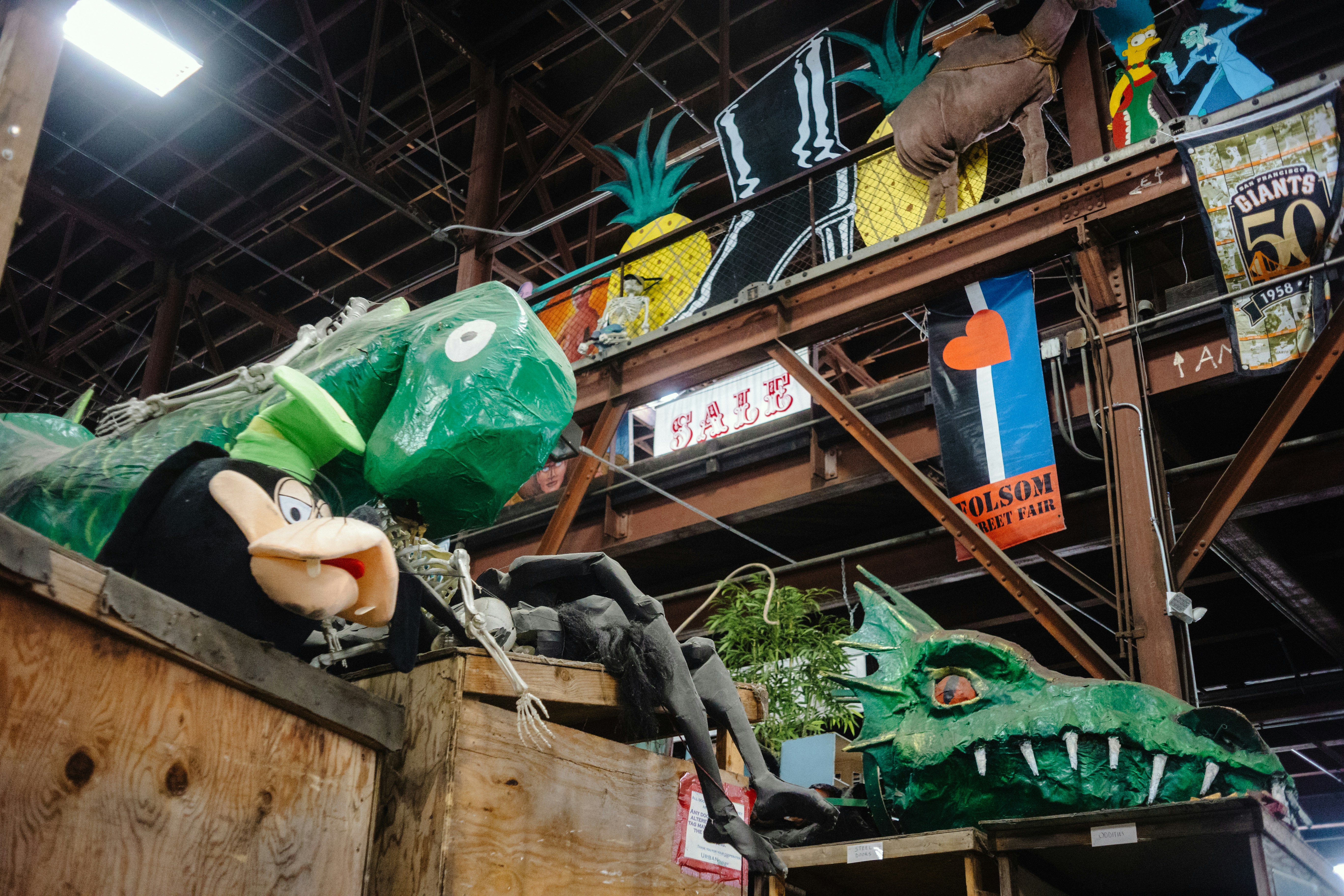 Green dragon heads and cartoon characters displayed