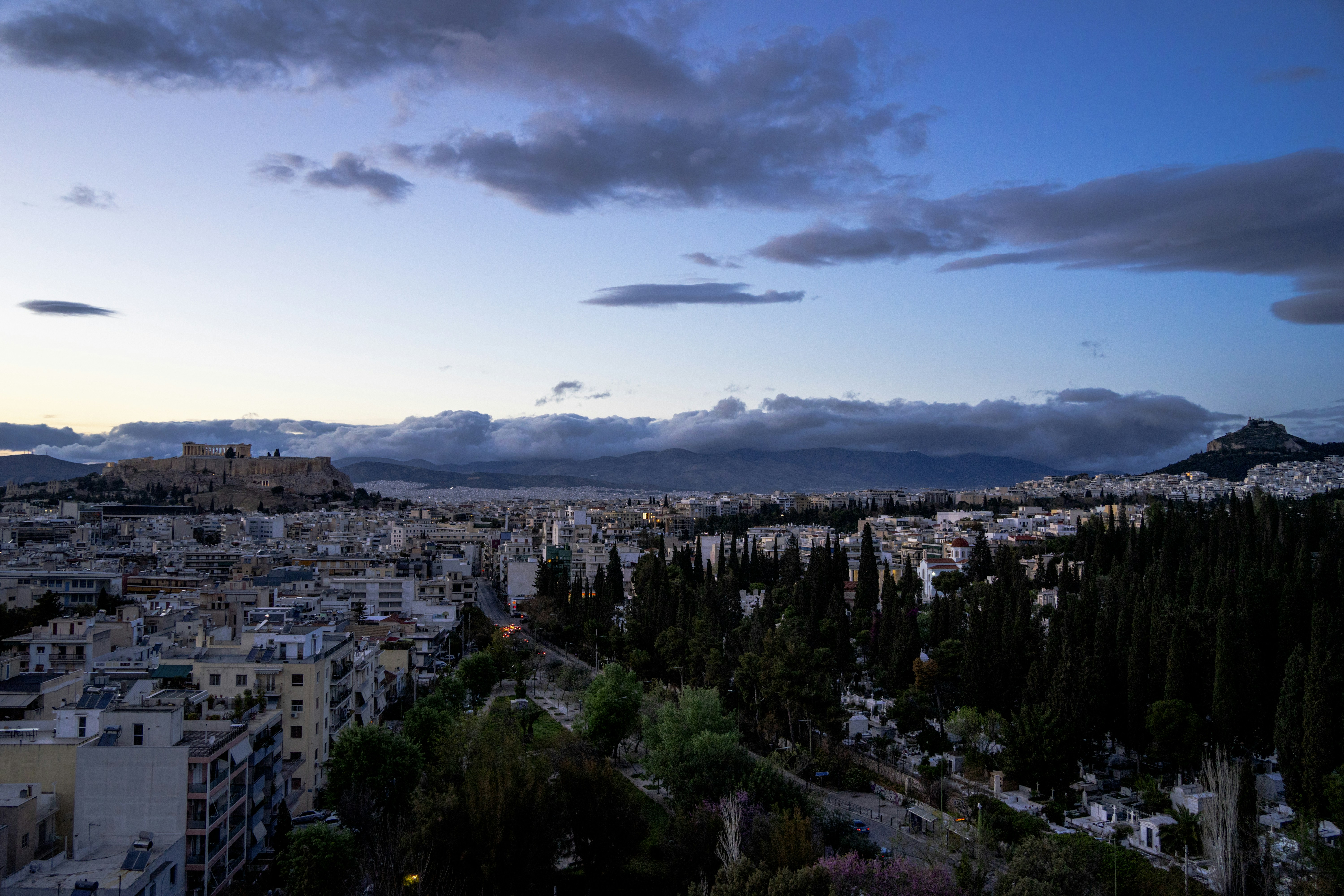 Cityscape with ancient ruins at dusk