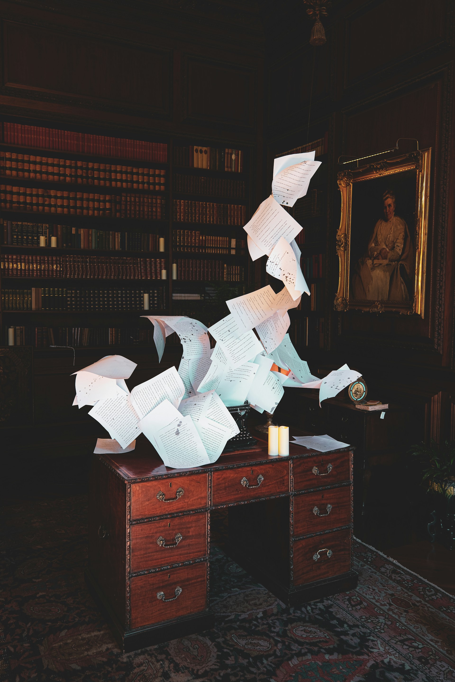 Papers flying from a desk in a library