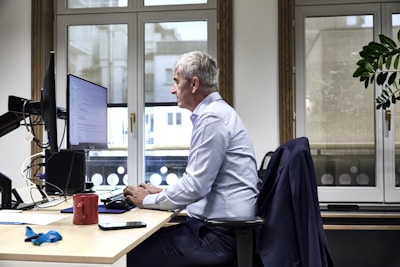 Man working at a computer in an office