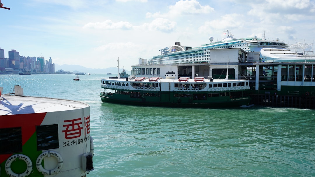Star Ferry crossing Victoria Harbour with Hong Kong skyline