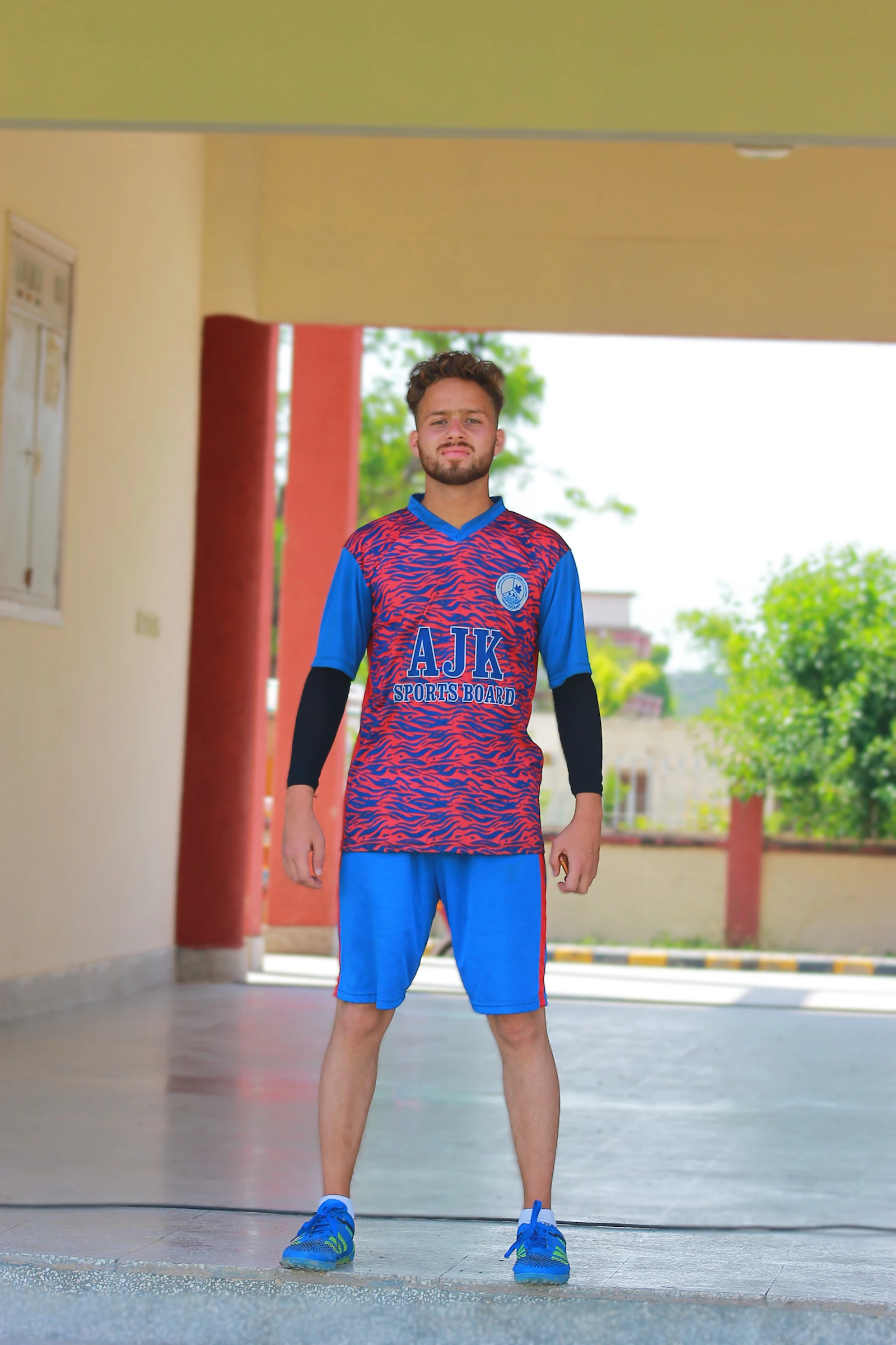 athlete in a custom team jersey, photographed in natural light.