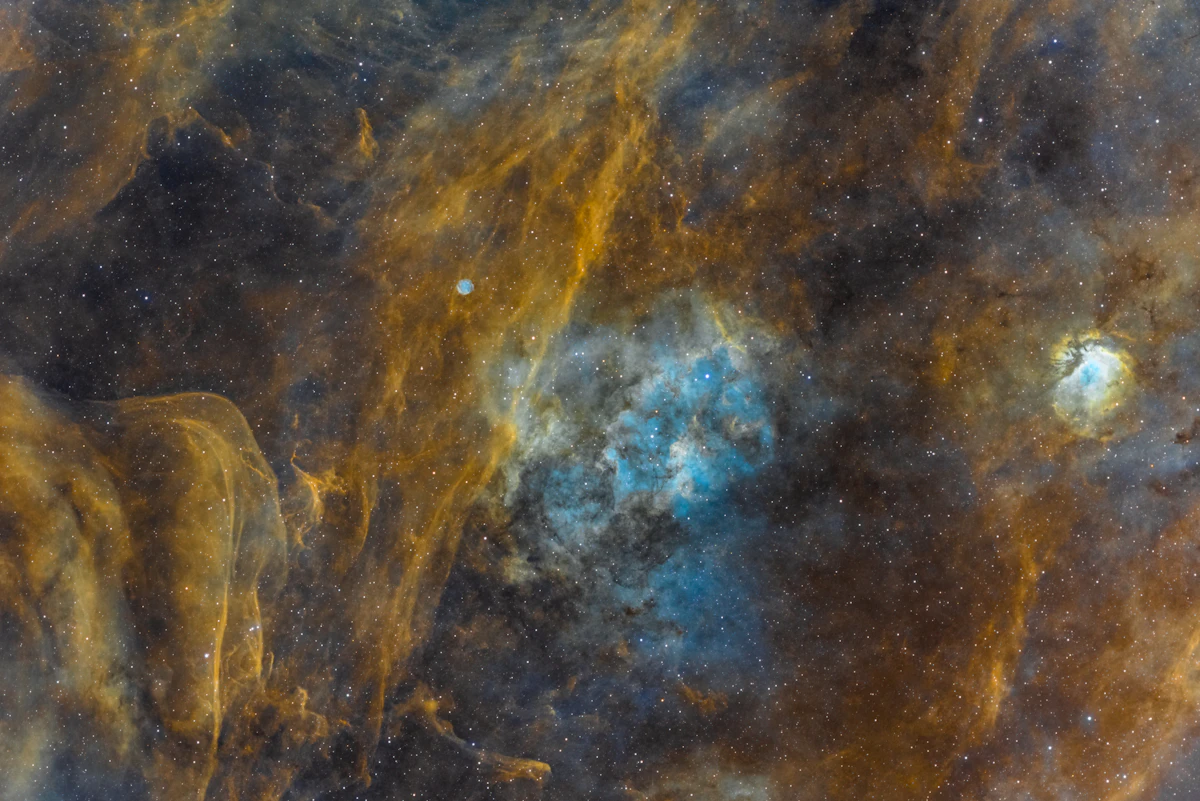 A green-tinted deep-space nebula
