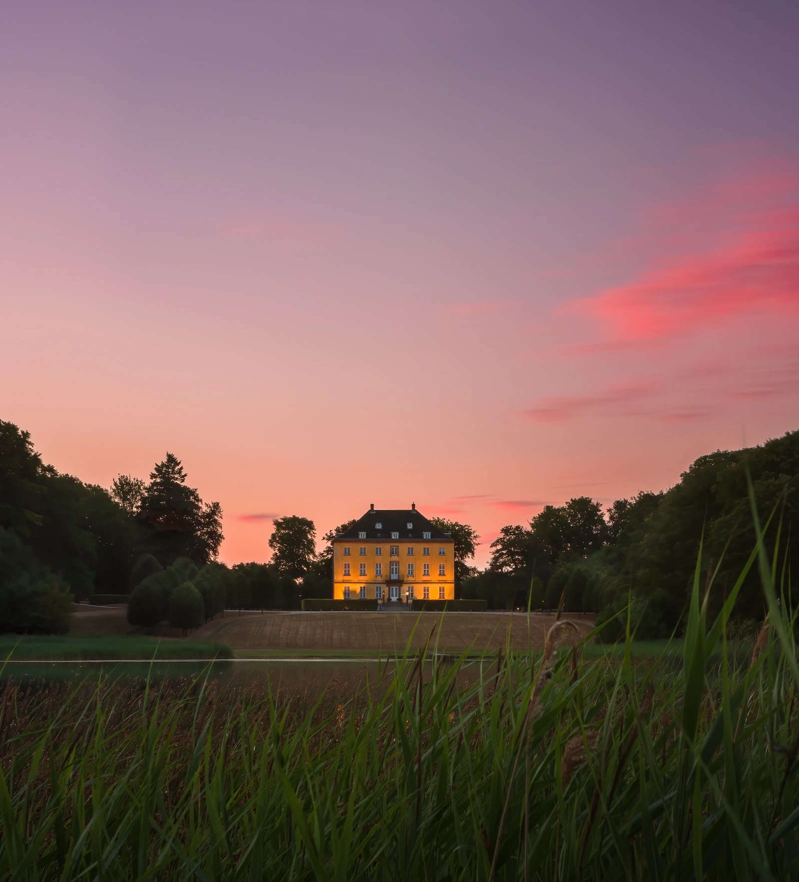 A private residence photographed at dusk