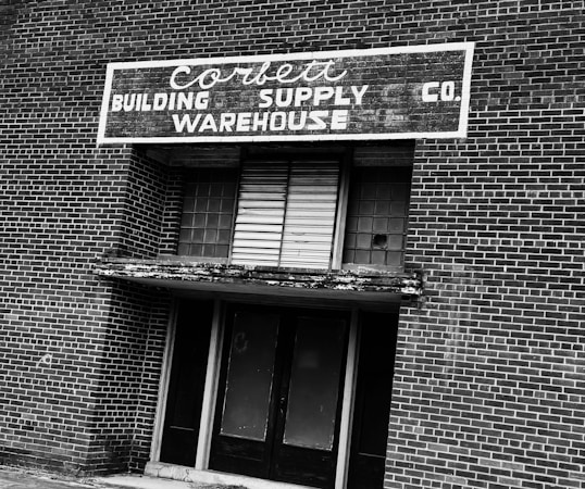 A building supply warehouse exterior, the kind of local contractor and supplier business that leases small-bay industrial space in southwest Las Vegas