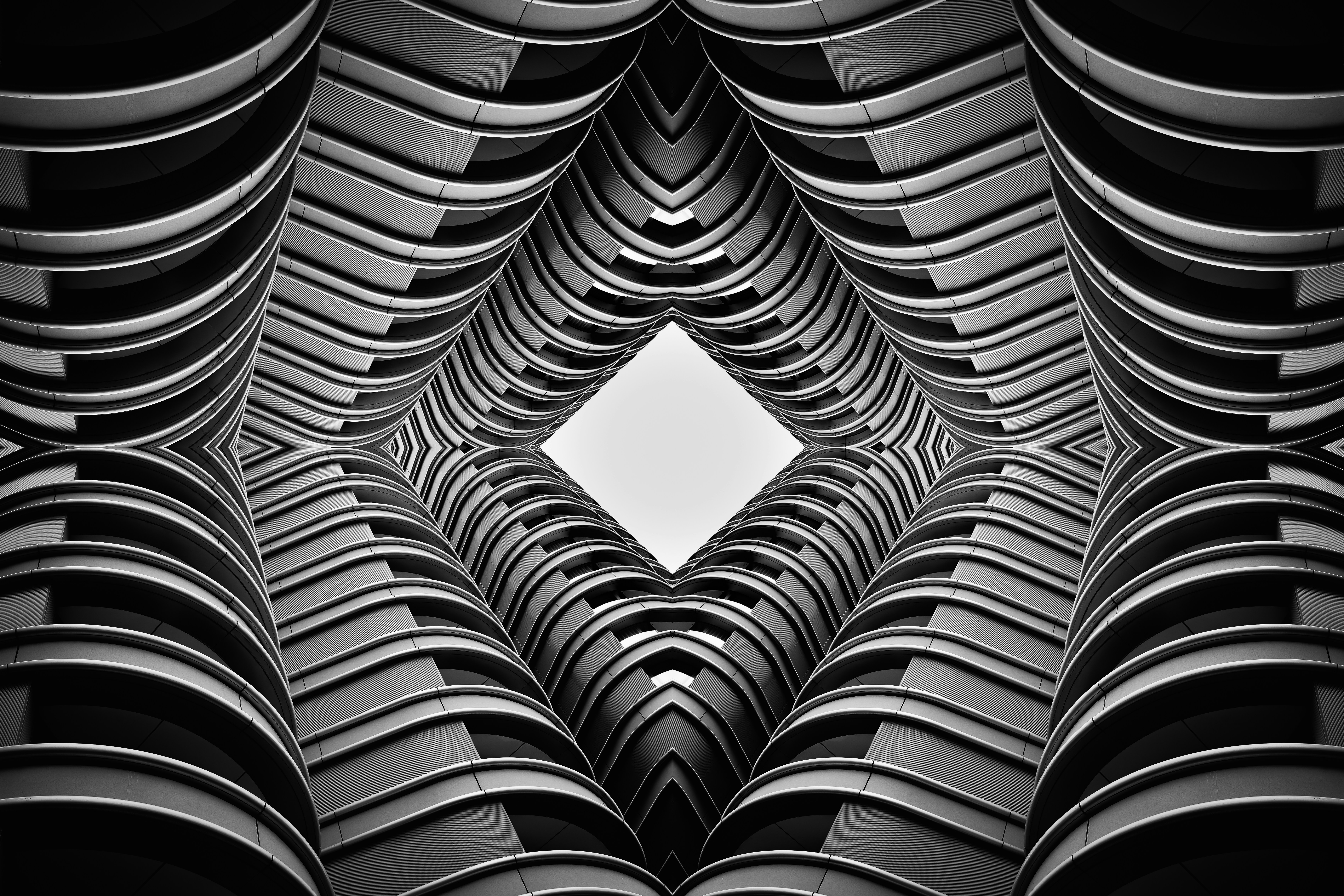 Symmetrical abstract architectural pattern looking upwards