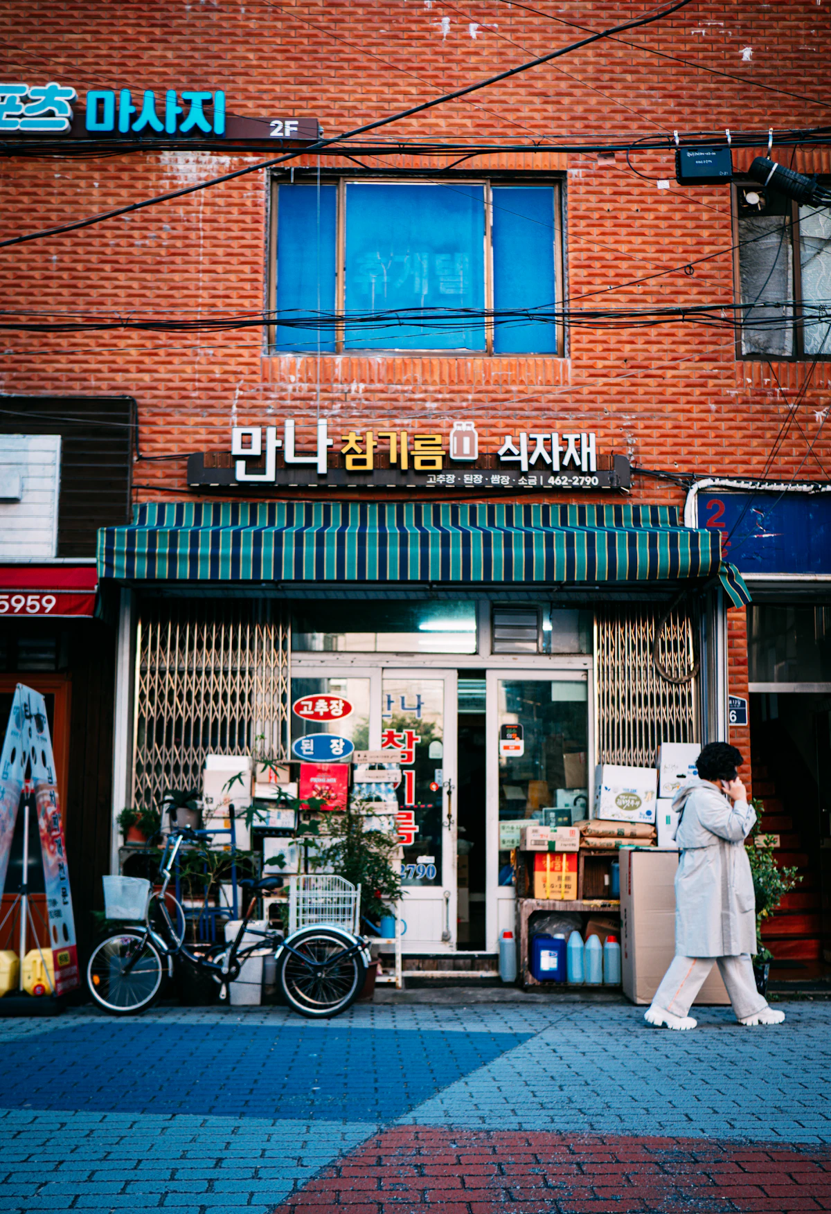 Korean sesame oil and cooking ingredient shop on a brick-fronted street