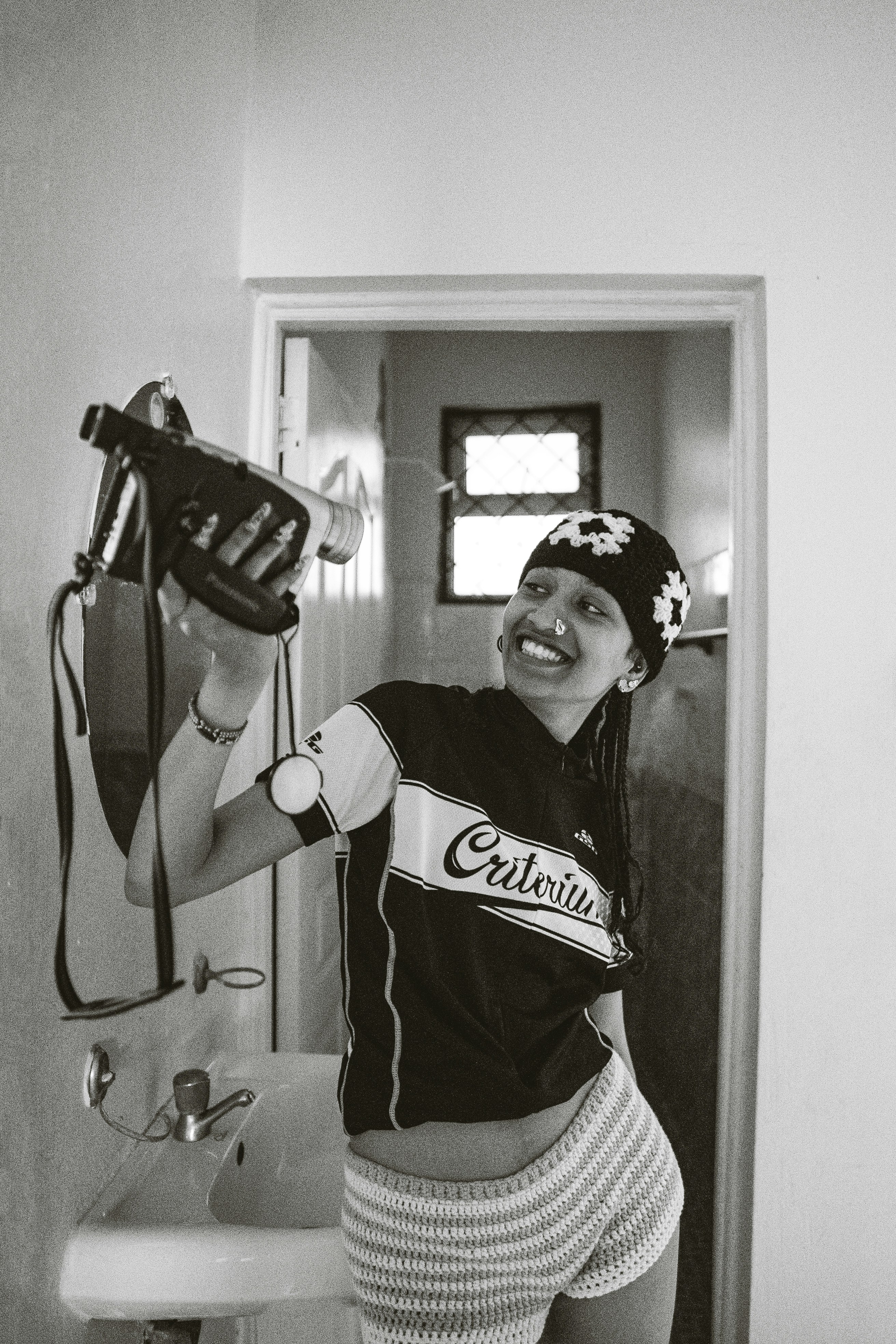 Kustomoitu tupsupipo logolla suunnittelussa