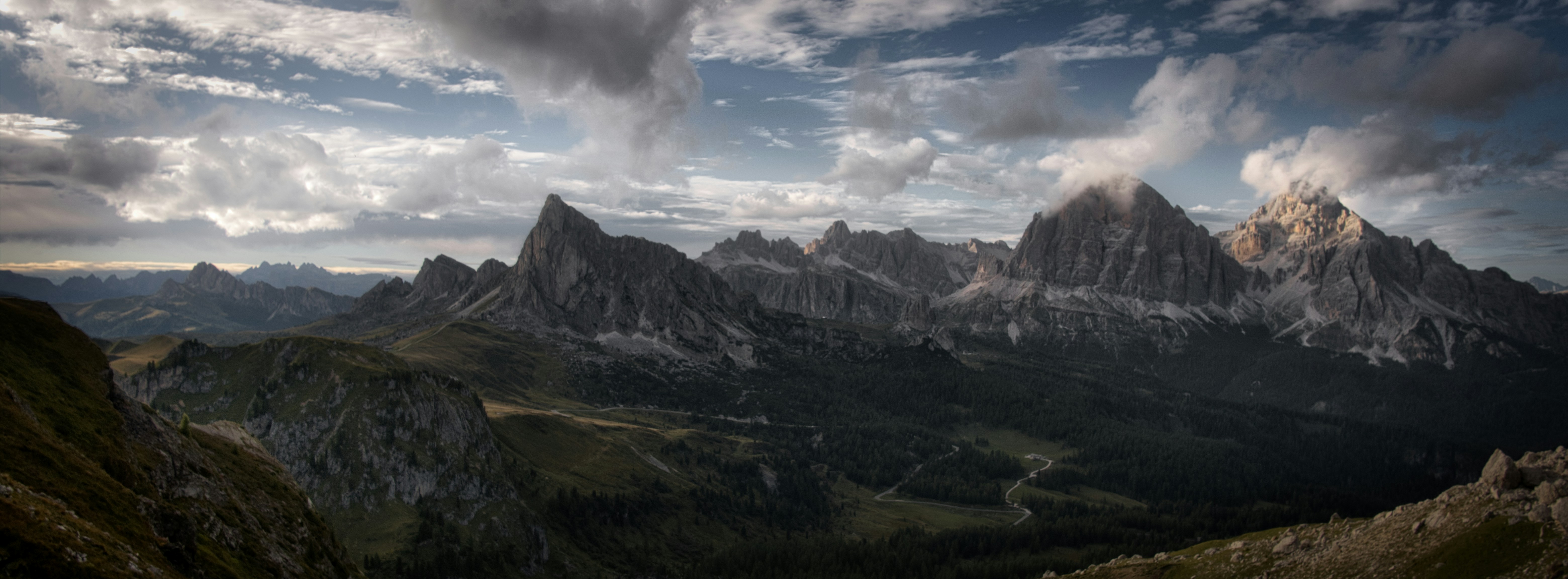 Dramatic mountain range under a cloudy sky