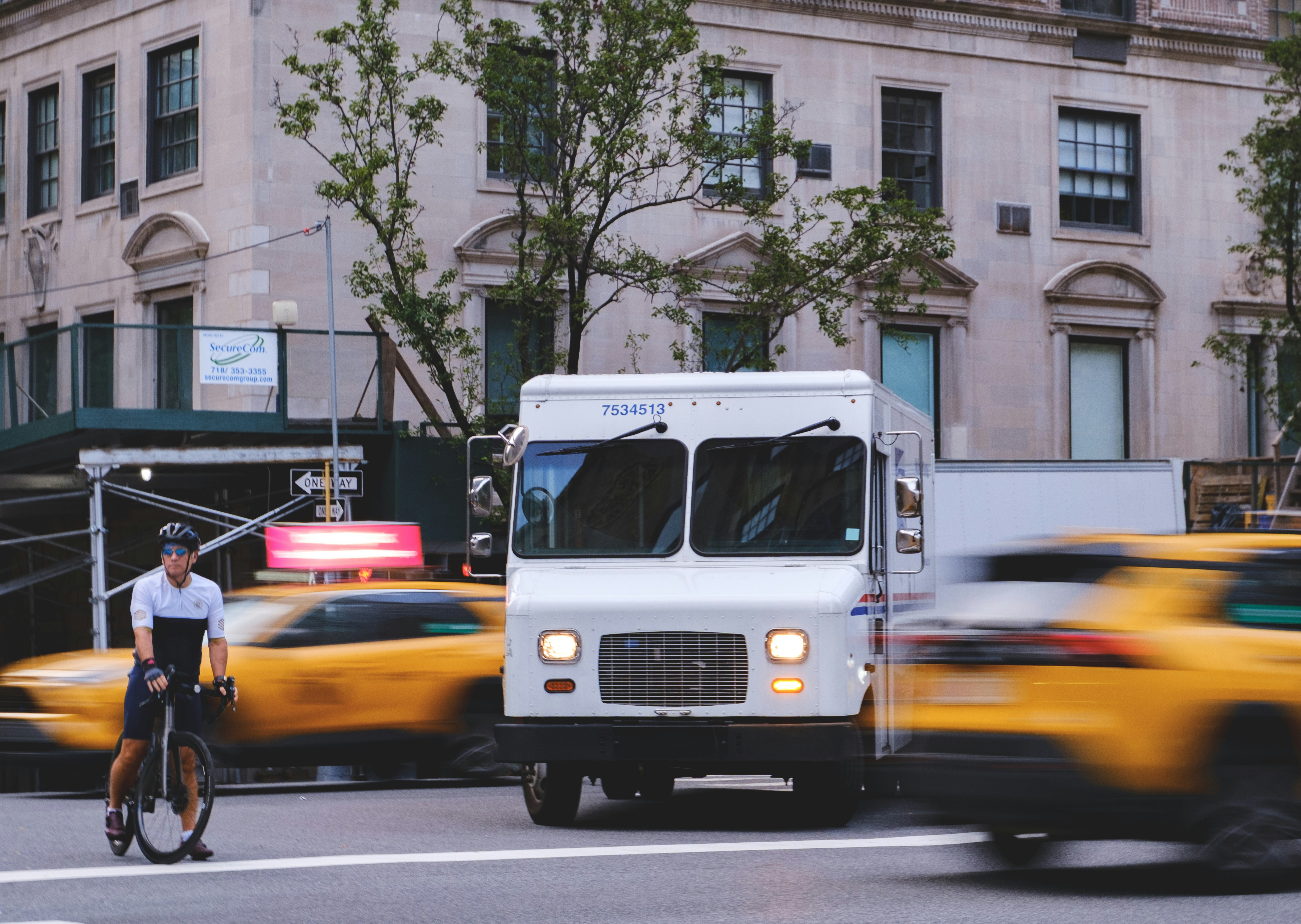 A delivery van on a city street.