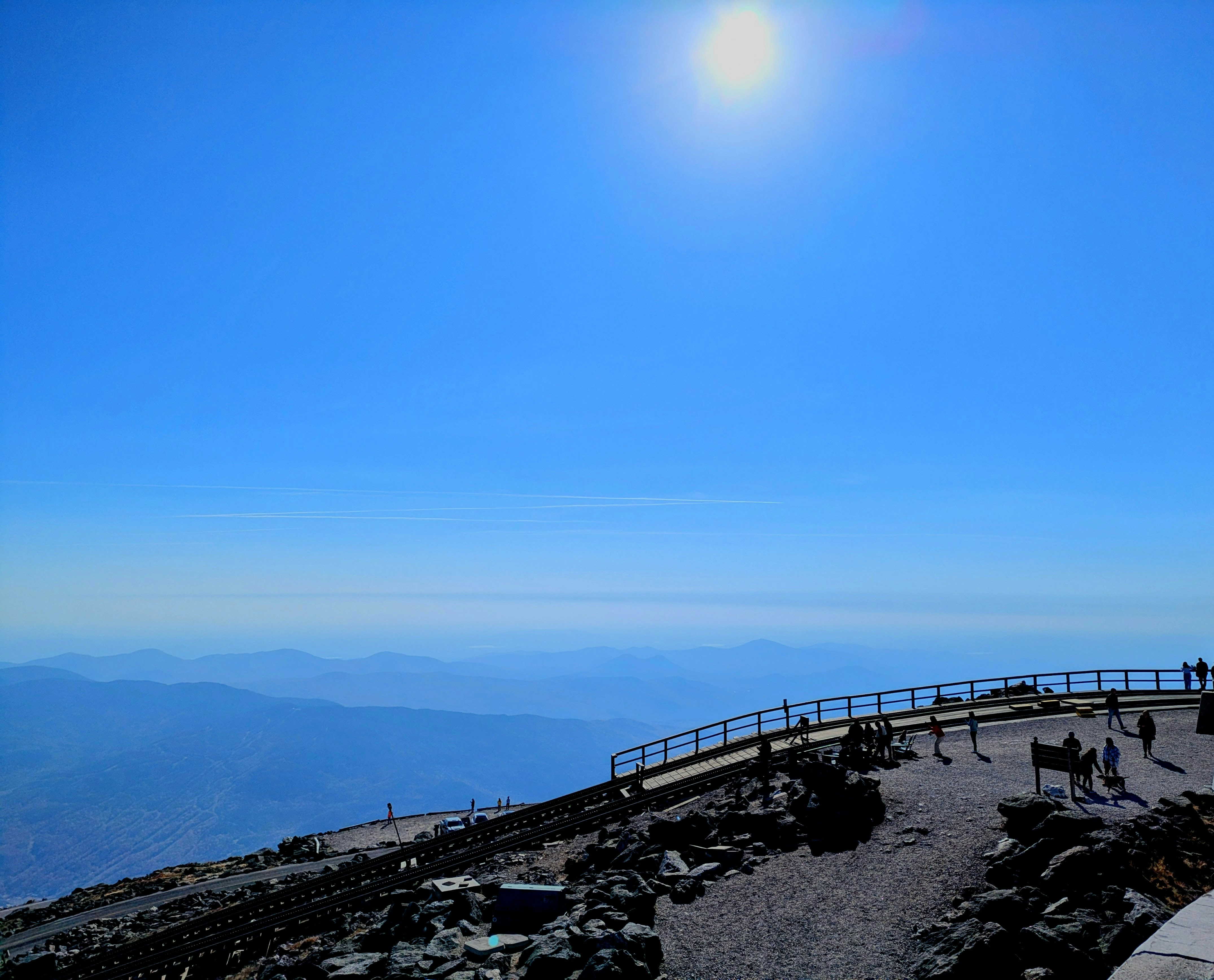 Sunny day with clear blue sky over mountains