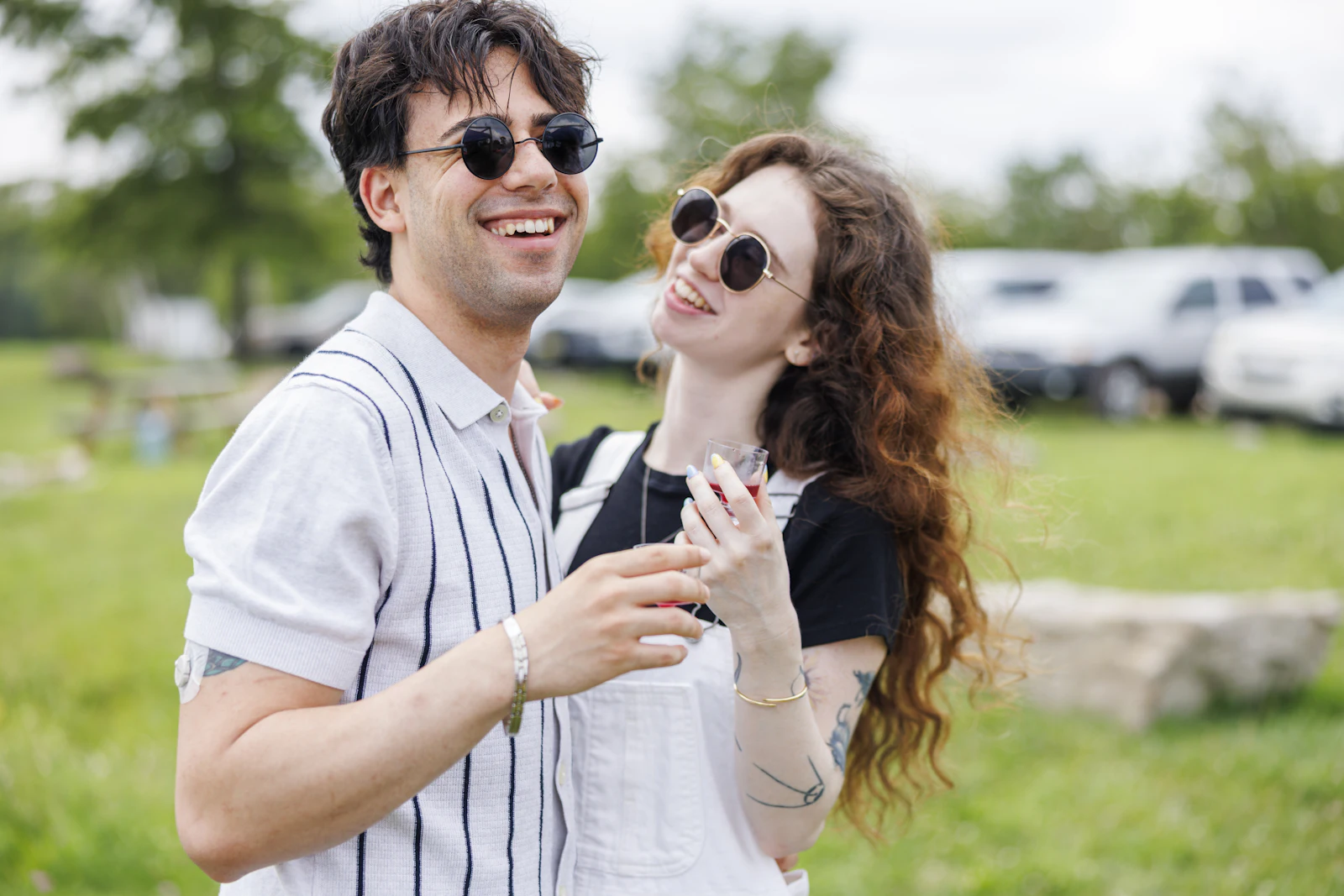 Young couple laughing outdoors