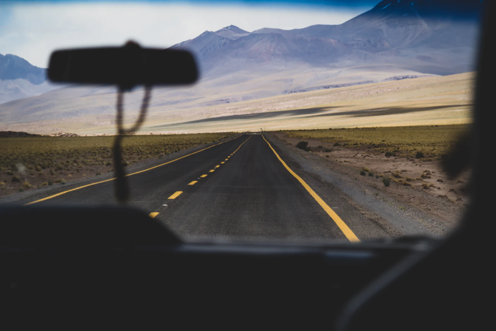 A paved desert highway approaching Calama in northern Chile
