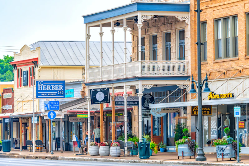 Historic small-town main street with charming storefronts representing local reputation built on community