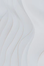 Abstract white wavy shapes with subtle shadows