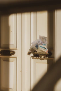 Mail piled up in a door slot