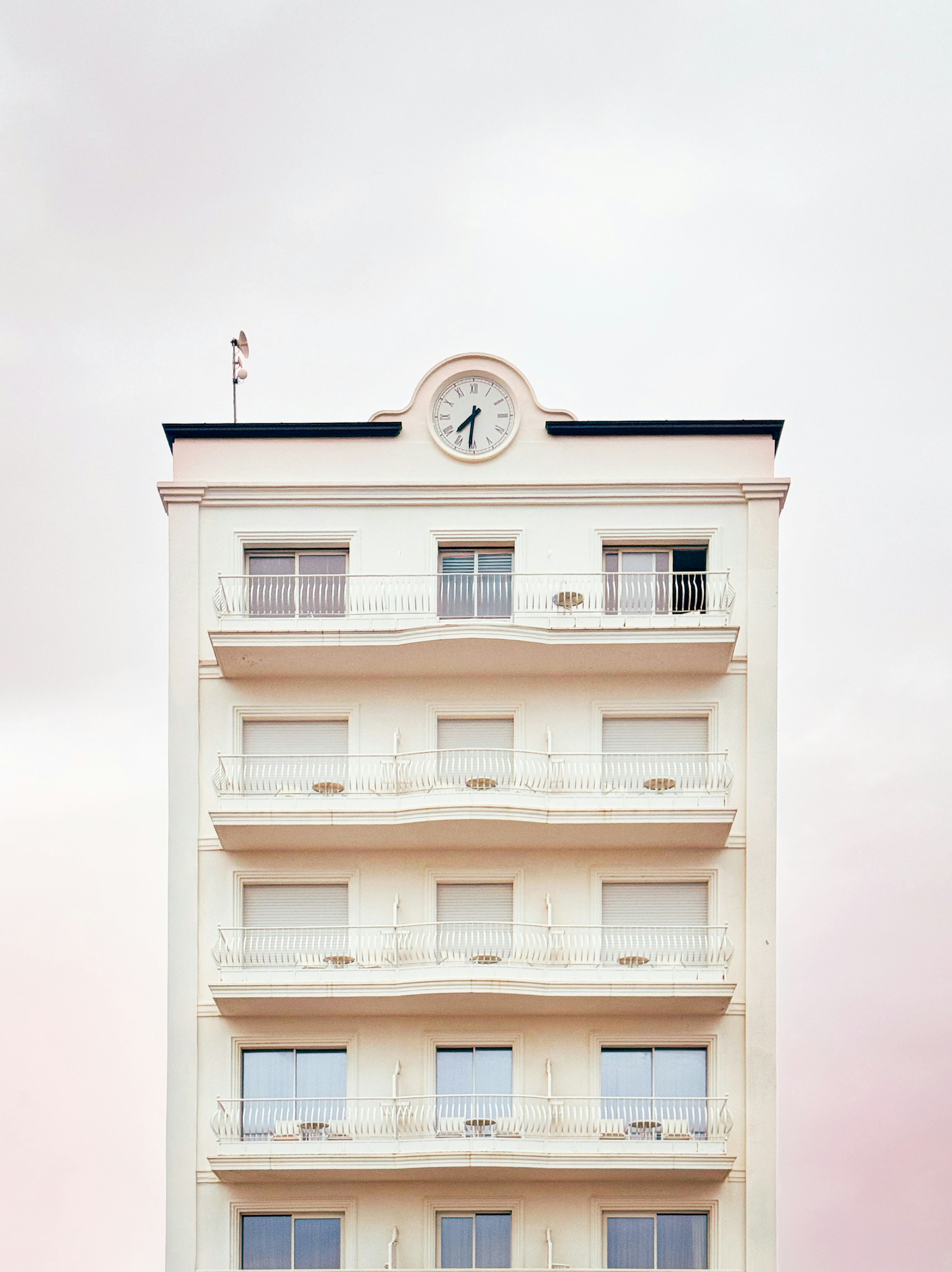 Cream colored building with clock on top