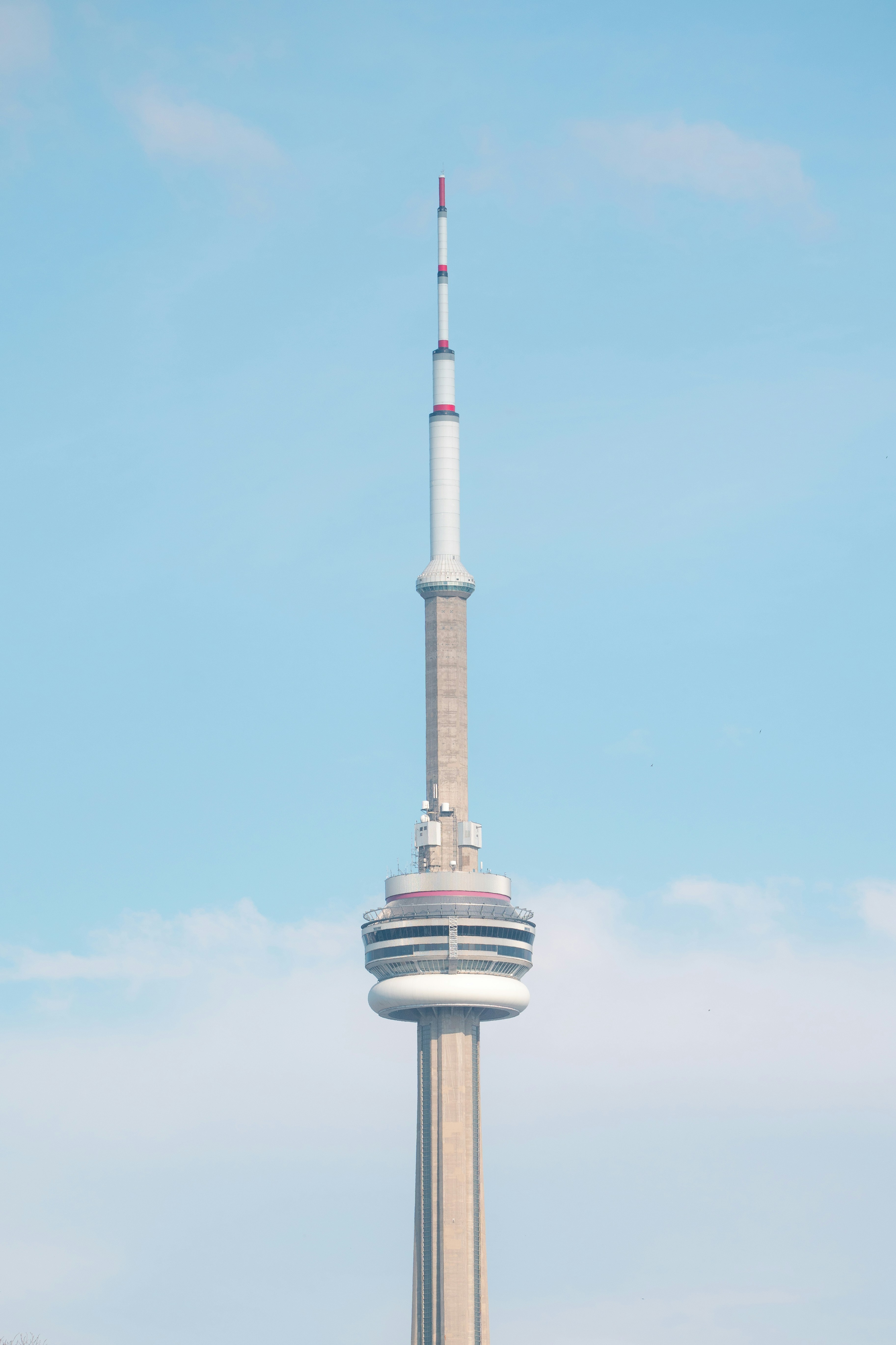 The cn tower against a clear blue sky.