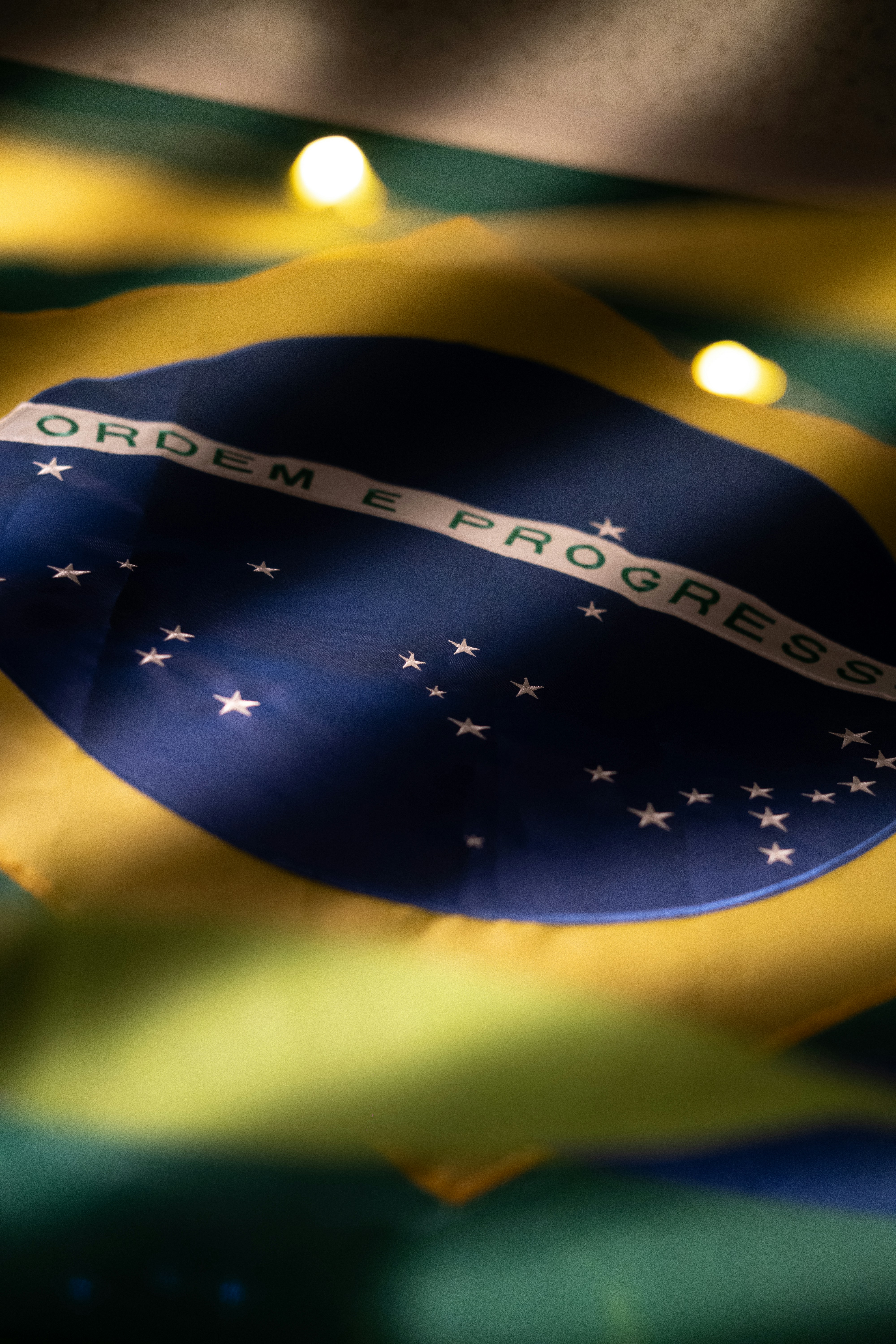 Close-up of the brazilian flag with lights.