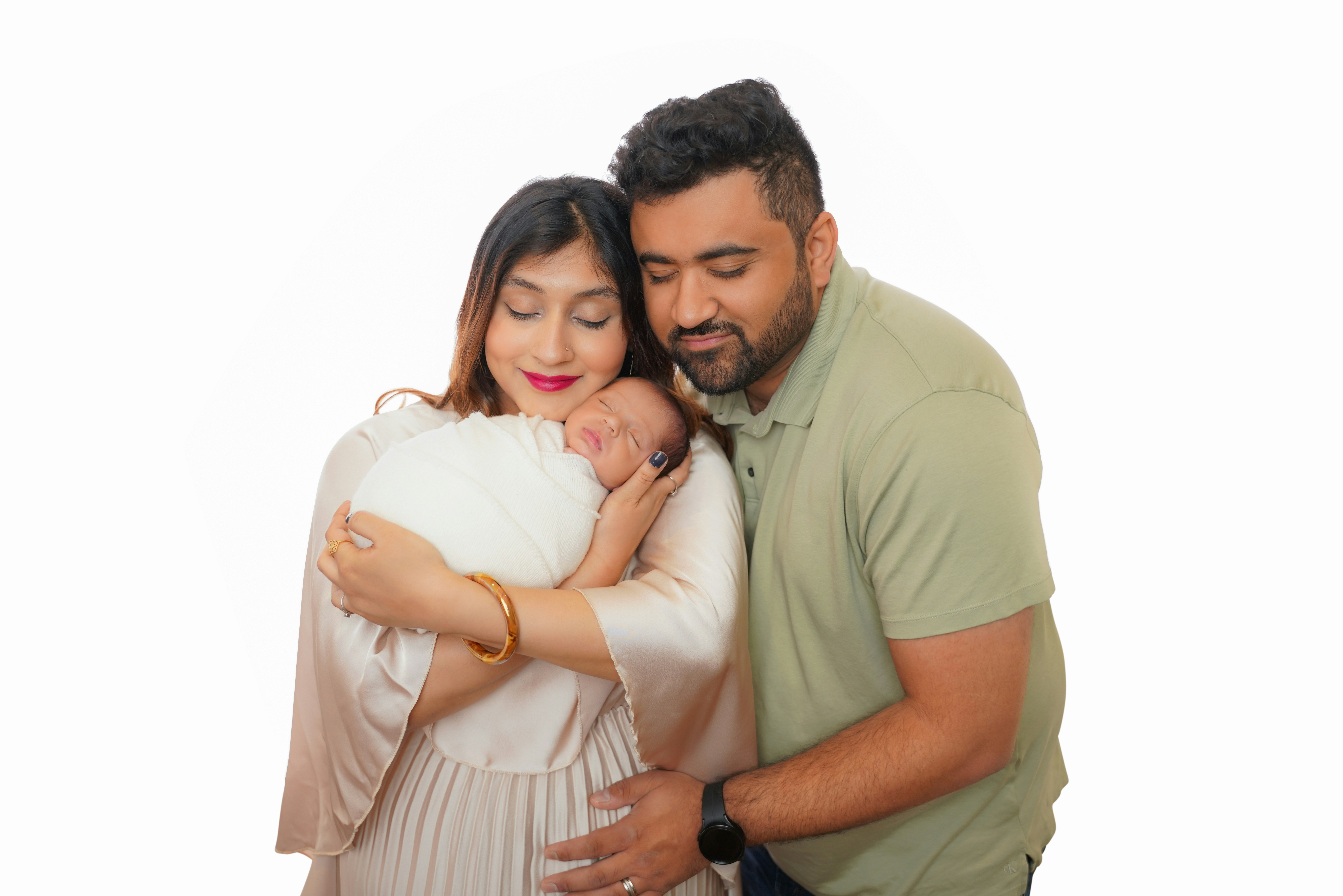 Parents holding their newborn baby with love