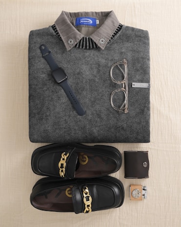 Flat lay of men's accessories and clothing