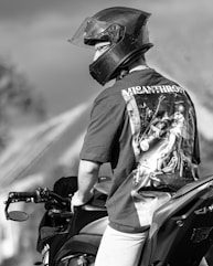Man wearing helmet on a motorcycle