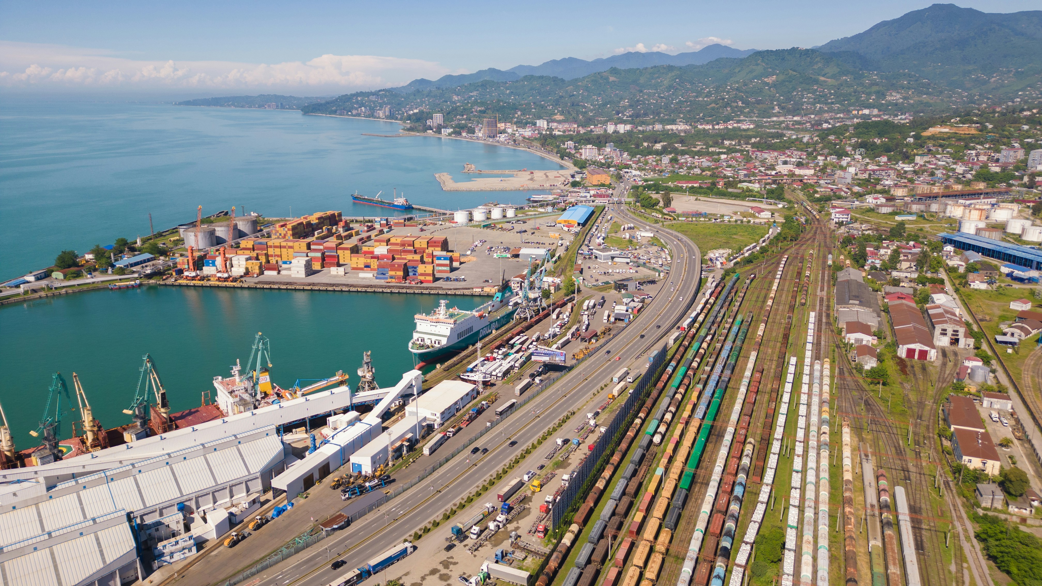 Busy port with ships and containers