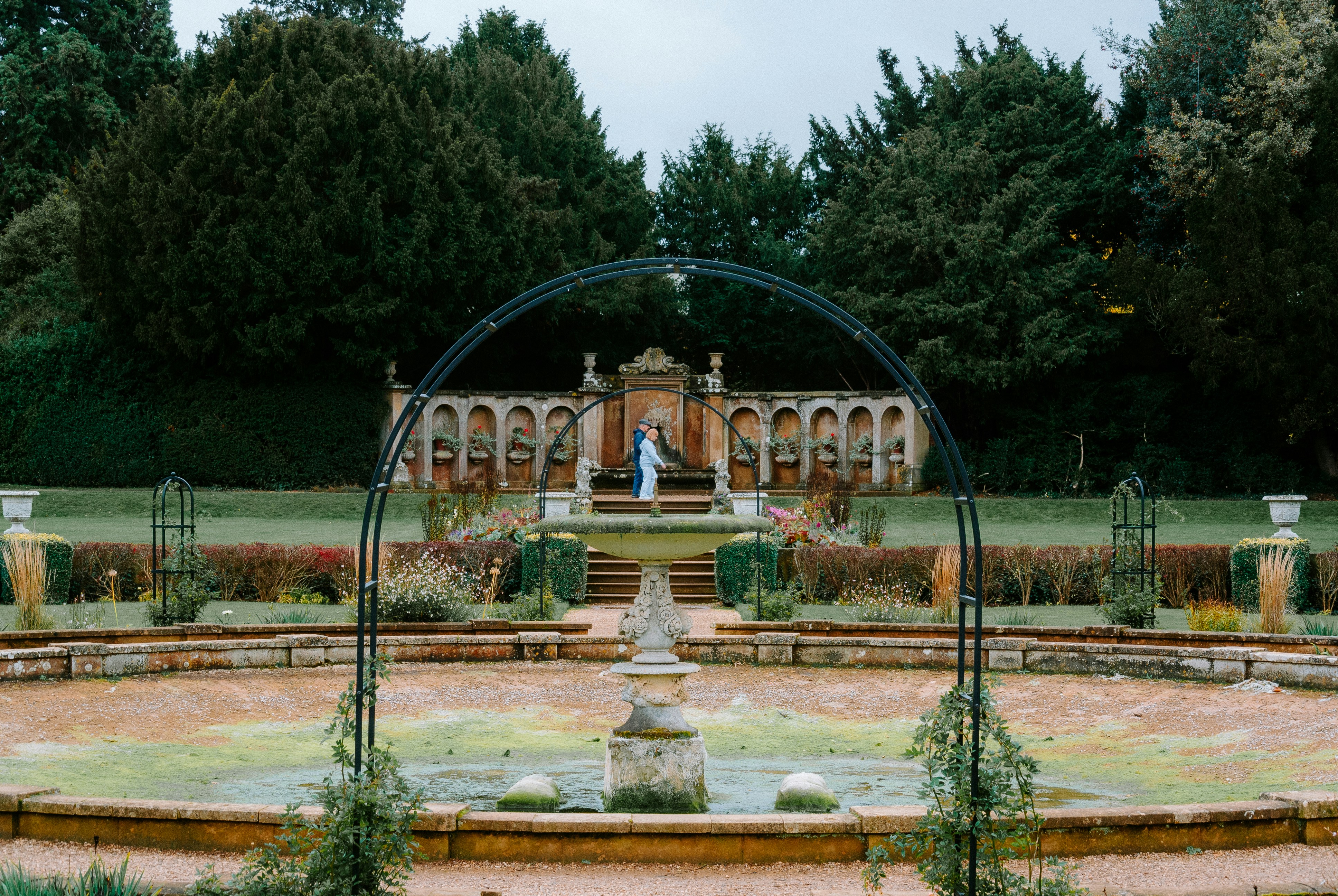Couple in formal garden