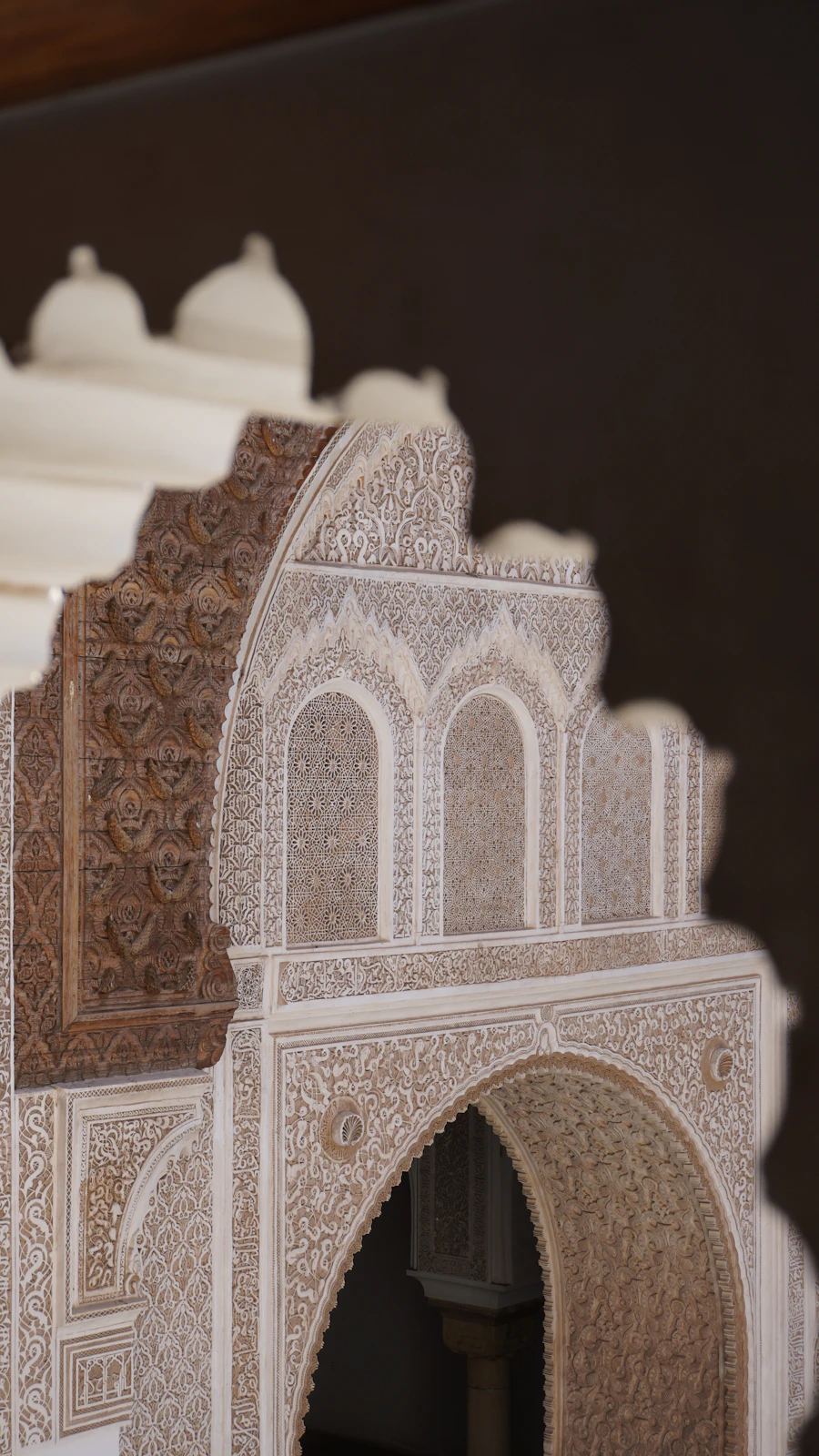 Intricate architectural details with ornate carvings and arches