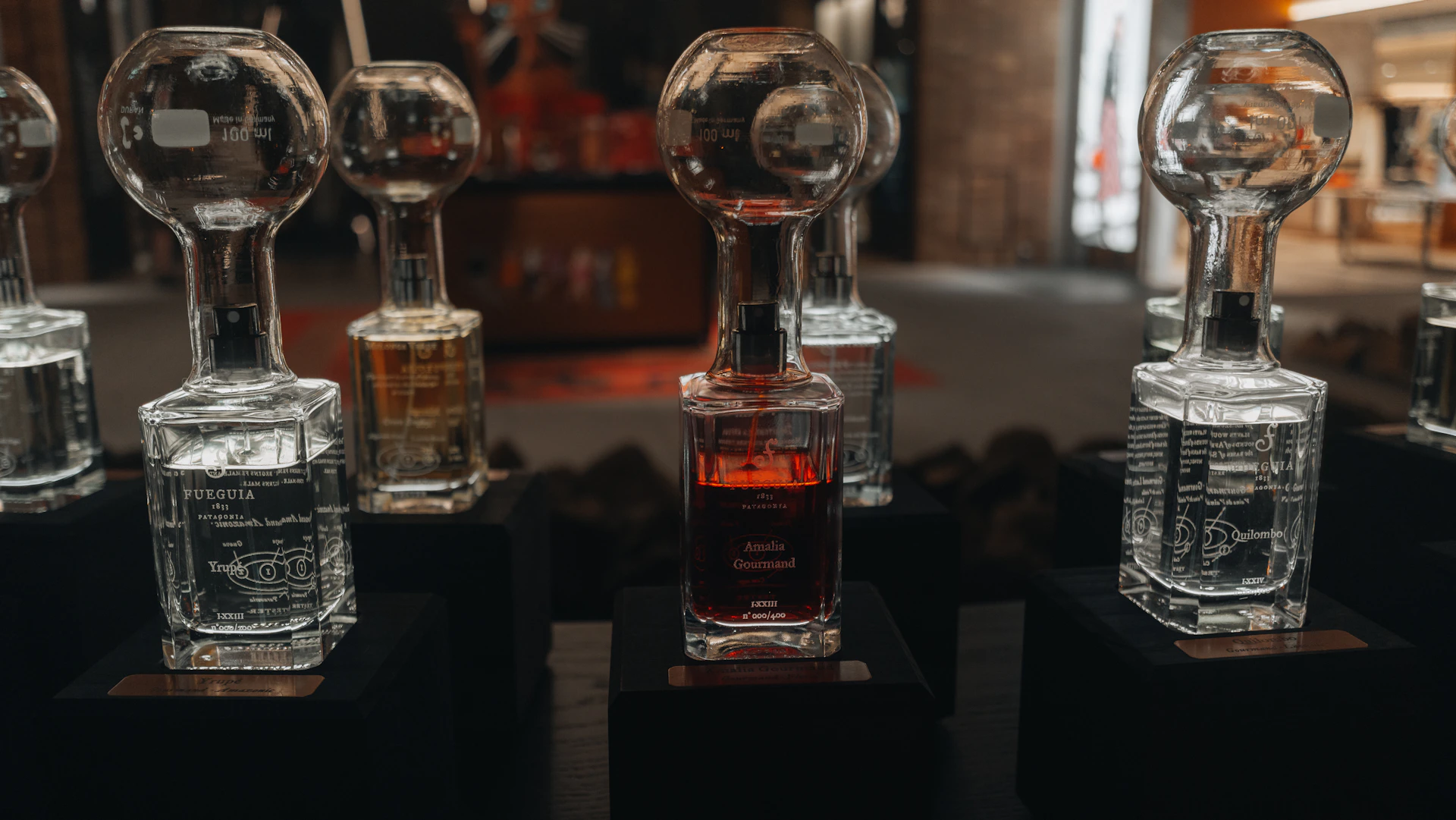 Several glass bottles with liquid displayed