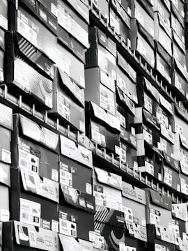 Rows of shoe boxes stacked high on shelves