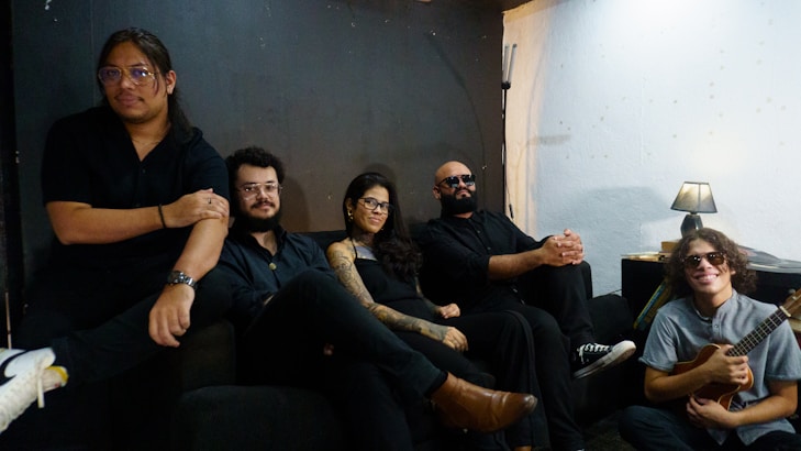 A group of people sitting on a couch