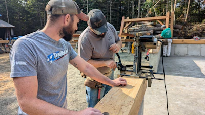 Two men working on a construction site