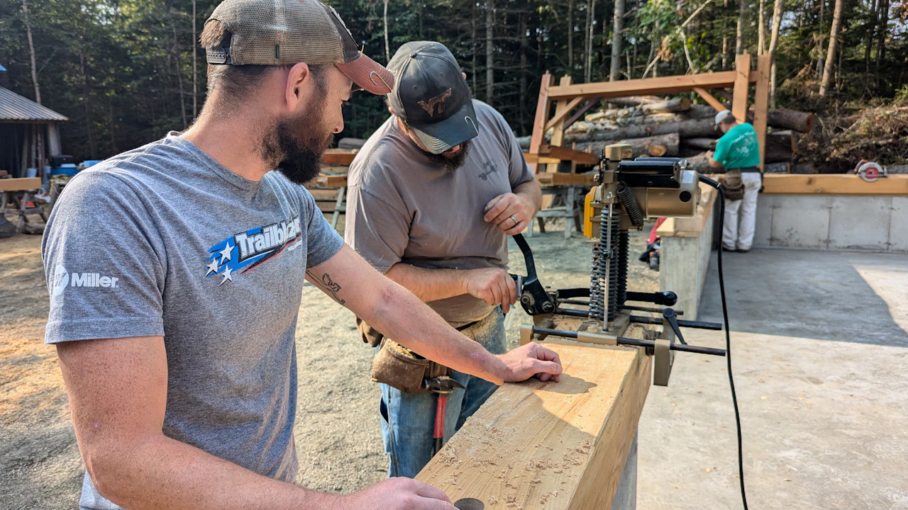 Volunteer working on a building renovation project outdoors