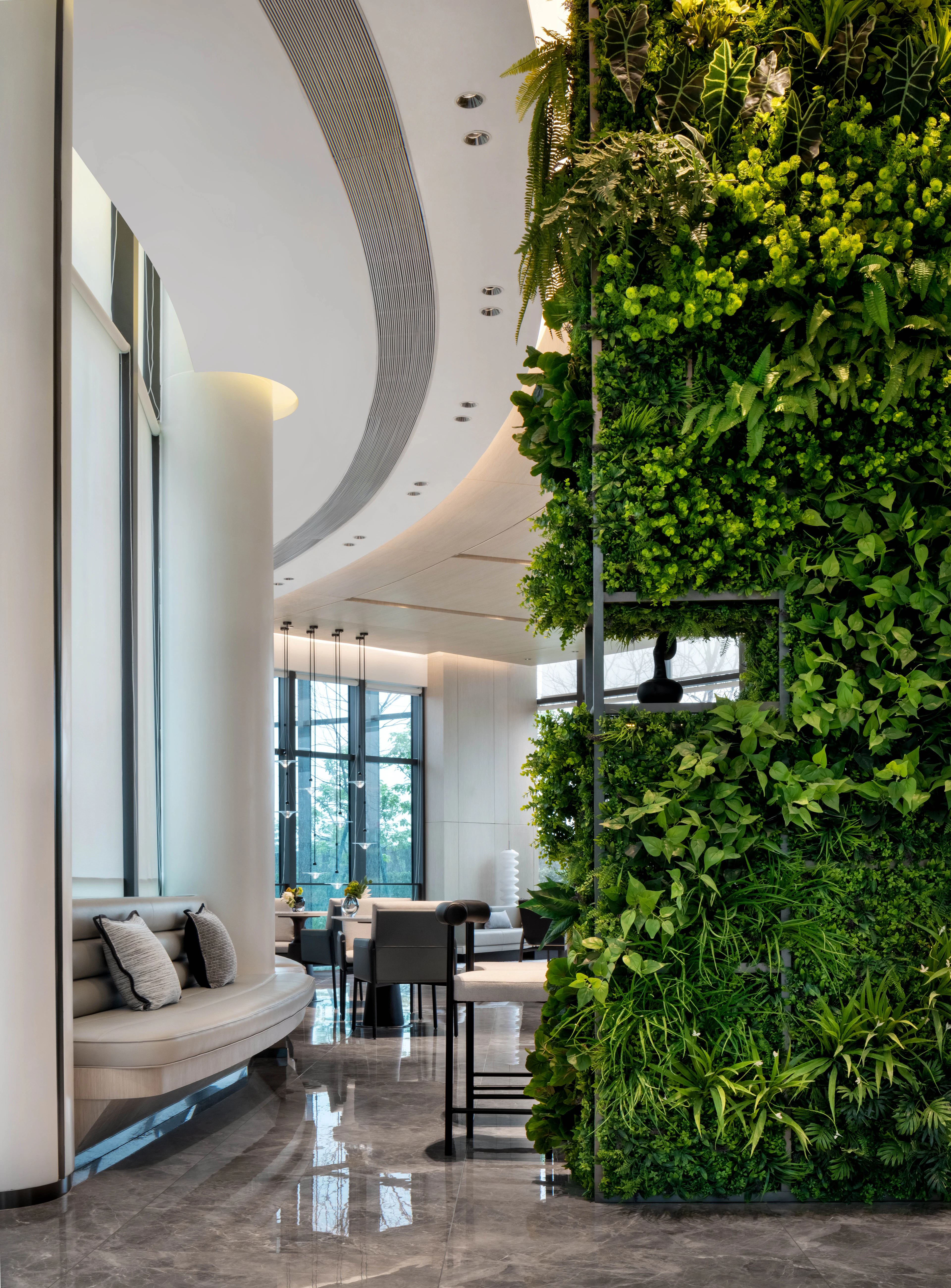 Modern interior with a vertical green wall