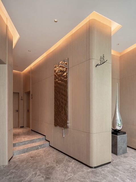 Modern hallway with artwork and sculptures