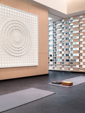 Yoga mats and props in a modern studio.