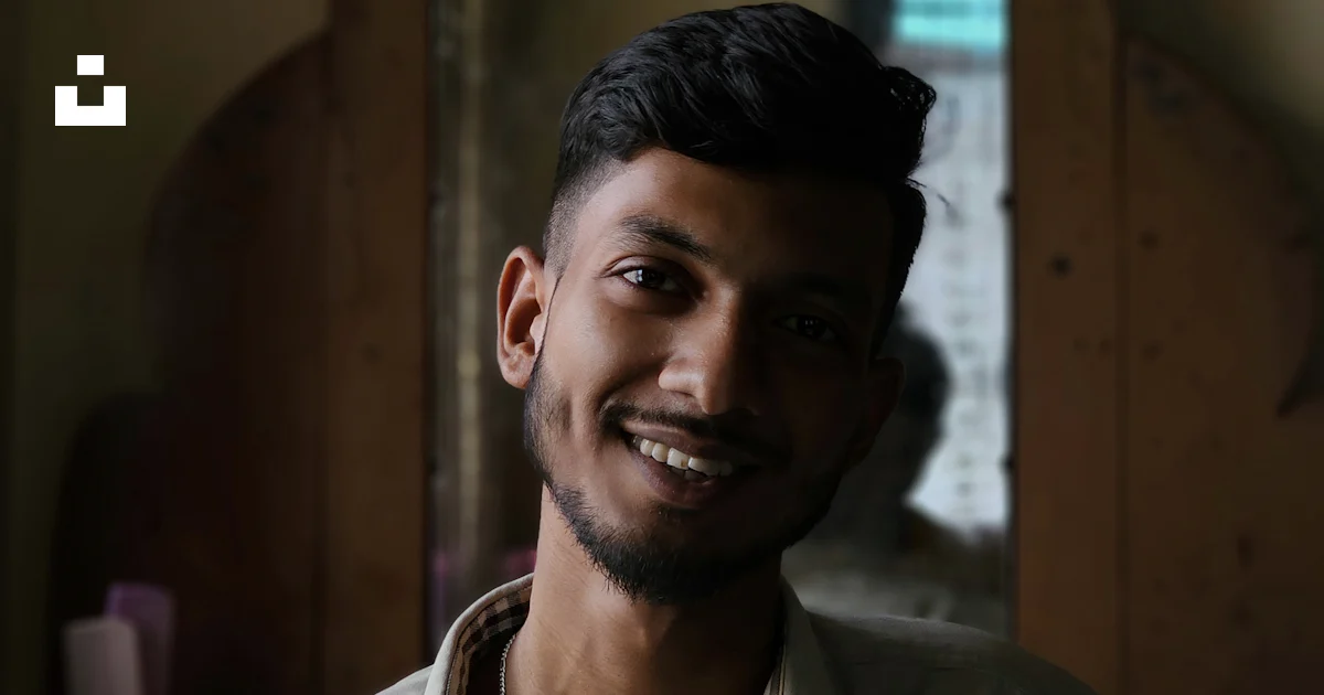 Dimples Man Made Young man with dimples smiling in a collared shirt photo – Free ...
