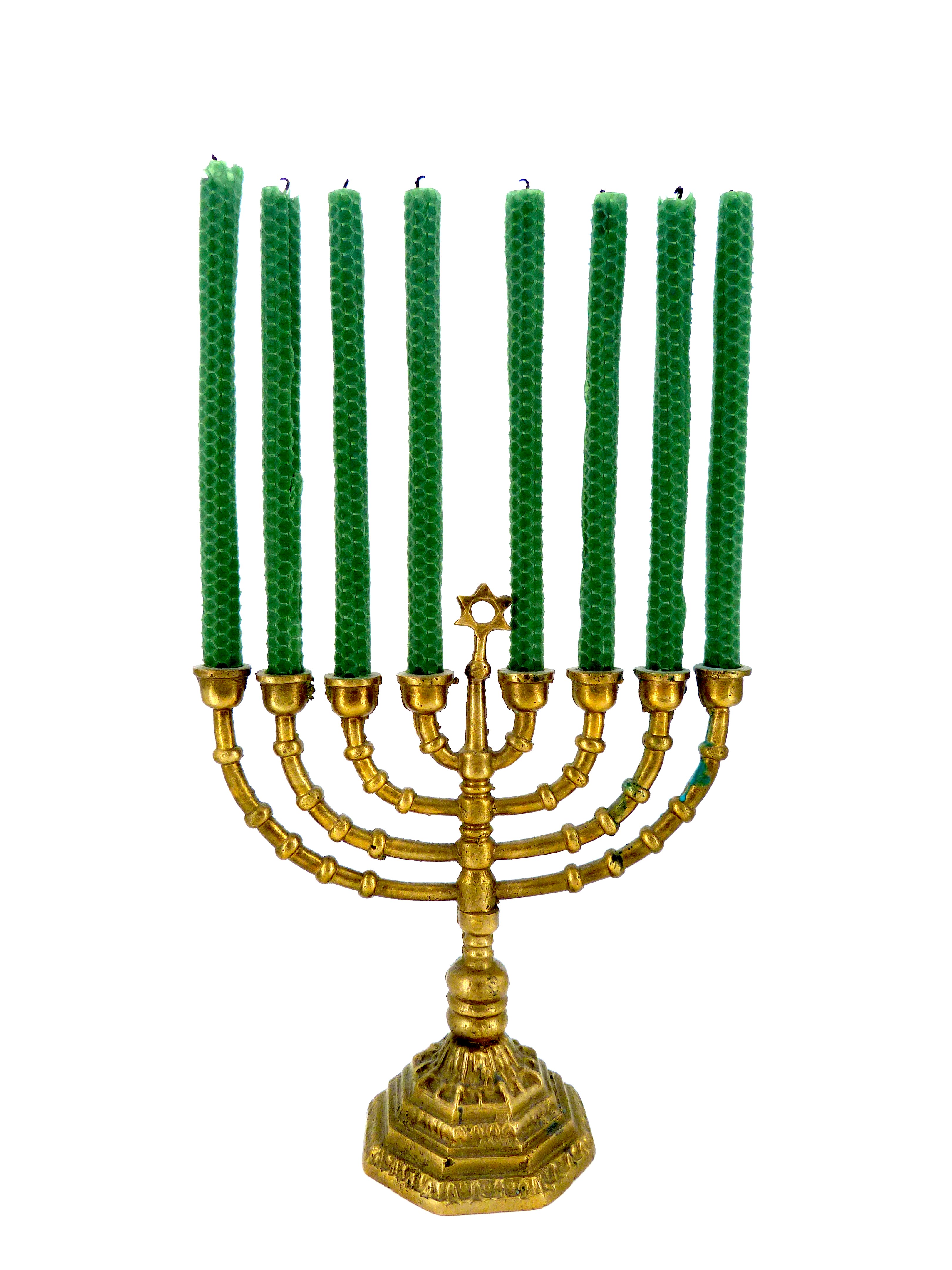 A brass menorah with nine green candles