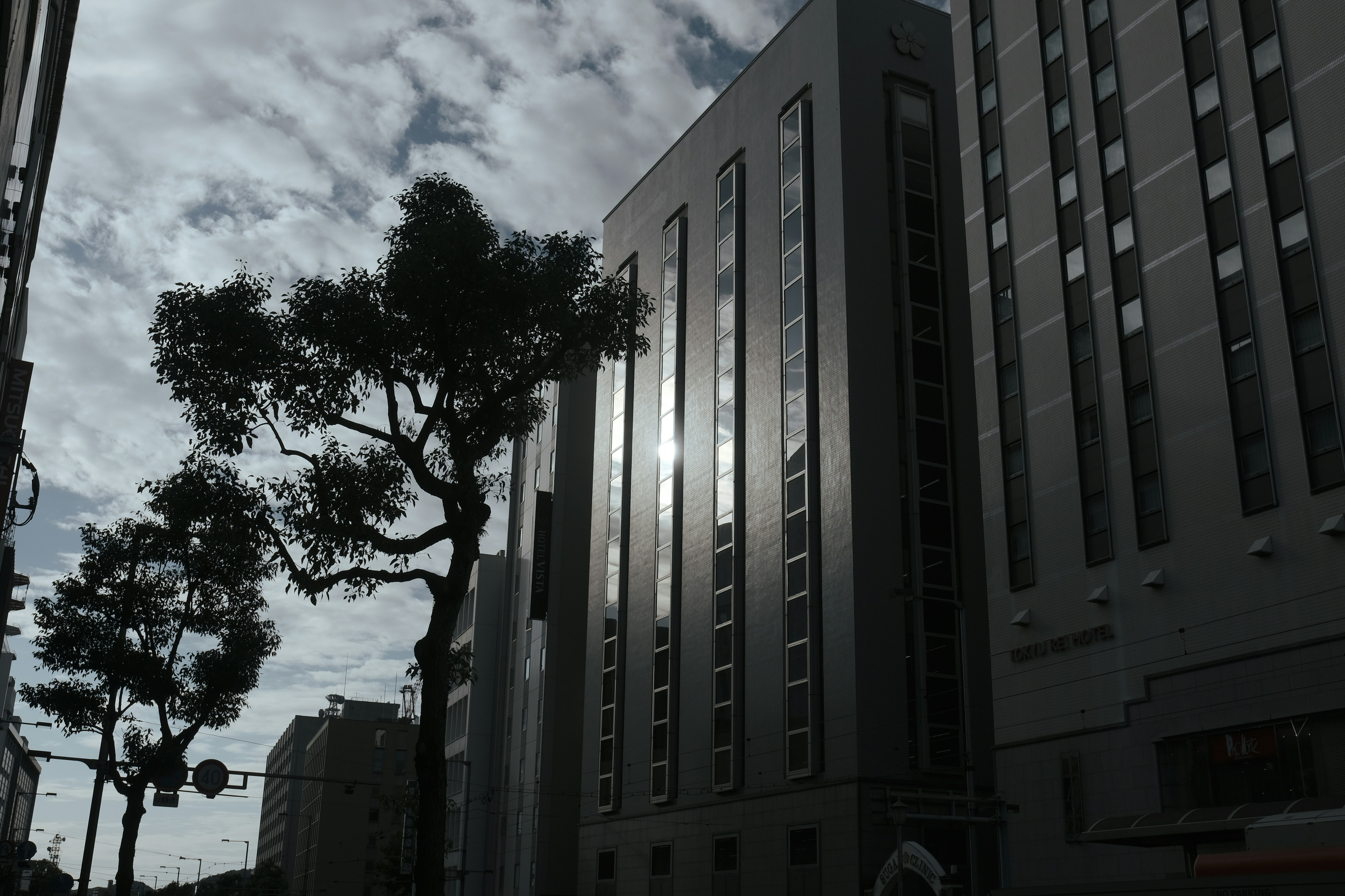 Modern hotel building with landscaping