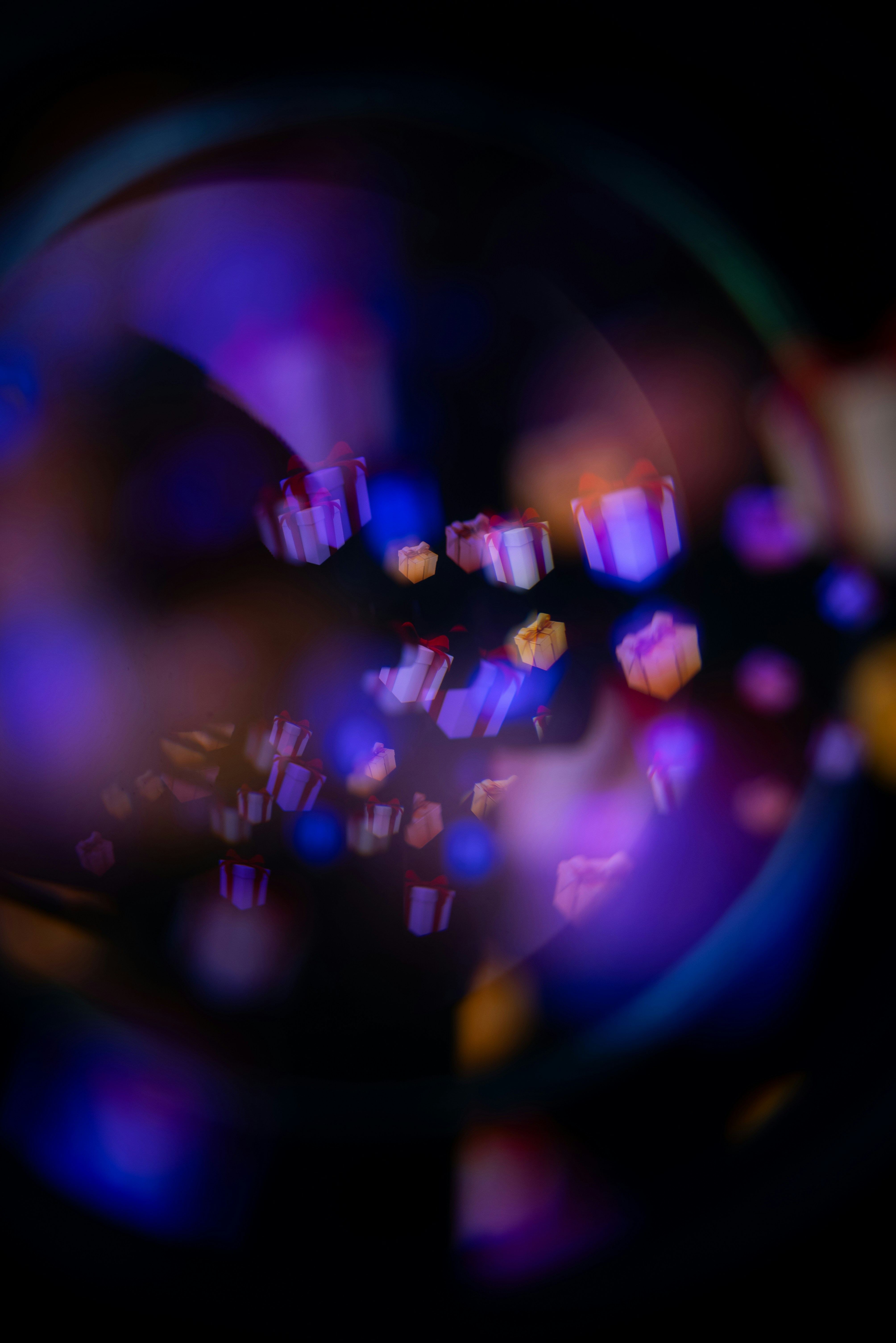 Bokeh lights in abstract purple and blue background.