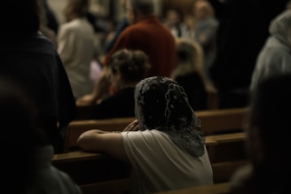 Woman wearing a headscarf in church