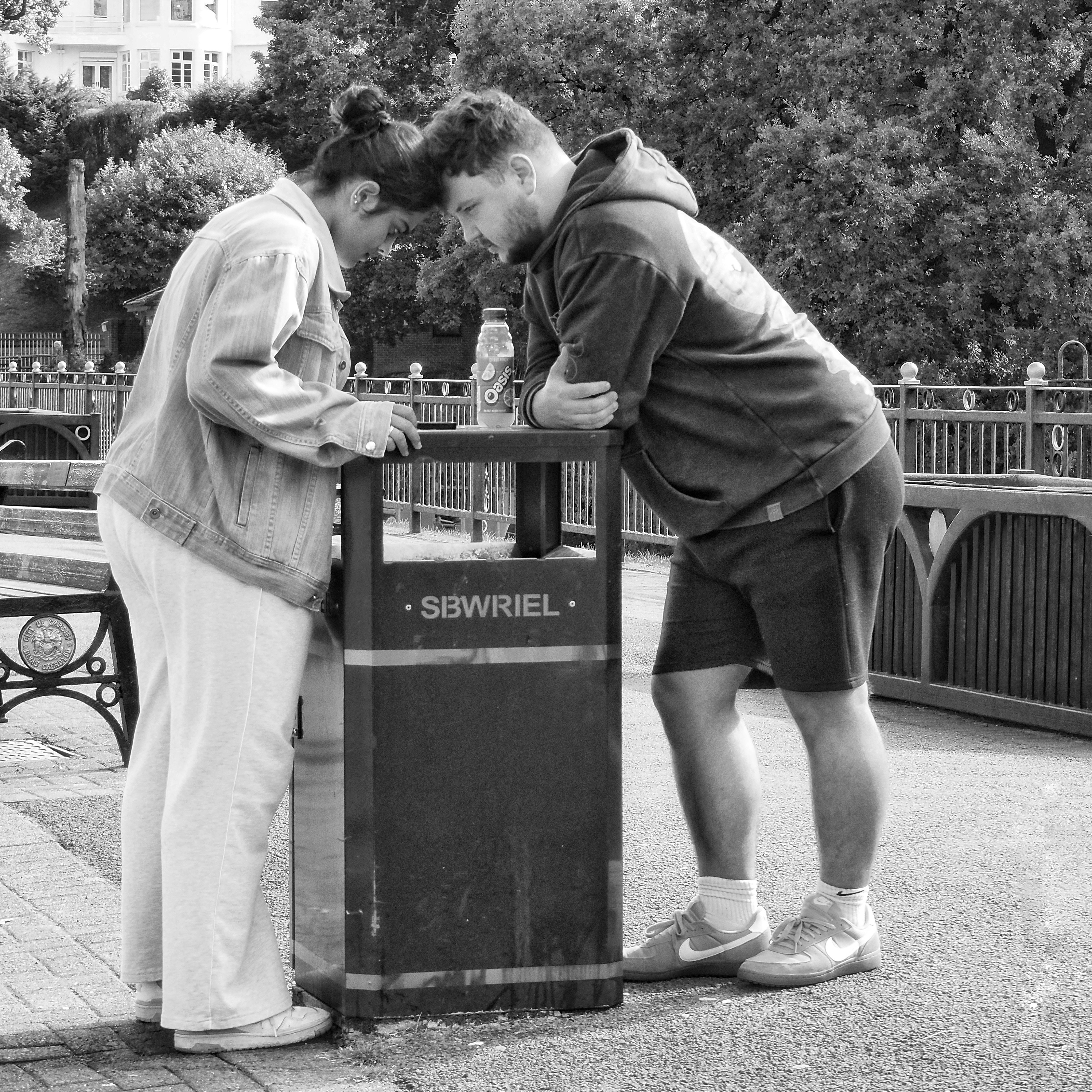 Current placeholder for Two people having a private conversation.